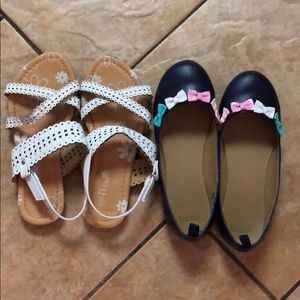 Two pairs of kid shoes.